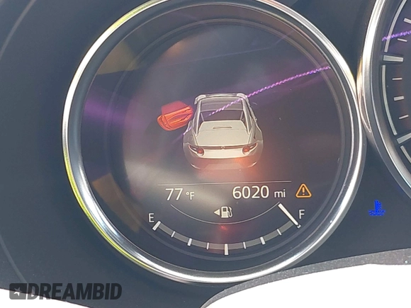 2023 Mazda MX-5 Miata Grand Touring z VIN JM1NDAM73P0561844, wystawiony jako IAAI lot #42195198 z przebiegiem 6 020 mil mil oraz . Historia ofert i sprzedaży dostępna na DreamBid. Obrazek 16.