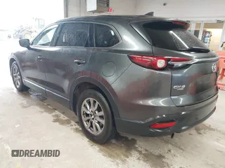 2017 Mazda CX-9 Touring with VIN JM3TCBCY1H0127229, listed as a IAAI auction lot 42320263 with 85,890 mi miles and . Bid and sale history available at DreamBid. Image 3.