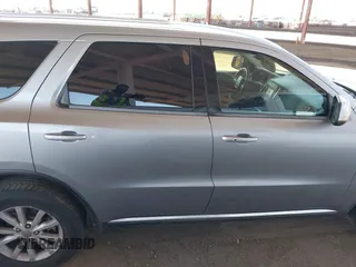 2015 Dodge Durango SXT z VIN 1C4RDJAG7FC240103, wystawiony jako IAAI lot #42621514 z przebiegiem 197 257 mil mil oraz . Historia ofert i sprzedaży dostępna na DreamBid. Obrazek 13.