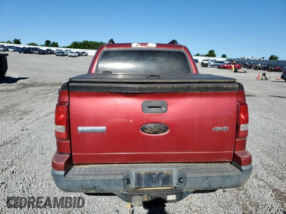 2007 Ford Explorer Sport Trac XLT with VIN 1FMEU51887UA09474, listed as a Copart auction lot 57625115 with 128,443 mi miles and Salvage title. Bid and sale history available at DreamBid. Image 6.