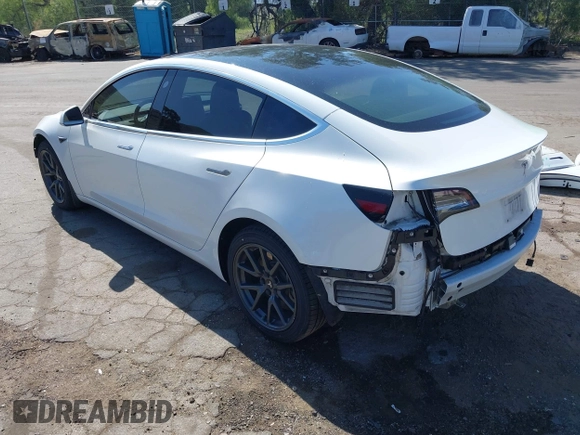 2018 Tesla Model 3 Long Range Battery with VIN 5YJ3E1EAXJF108781, listed as a IAAI auction lot 41962628 with 61,208 mi miles and . Bid and sale history available at DreamBid. Image 3.
