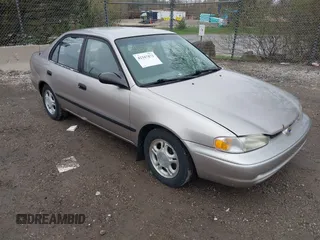 1999 Chevrolet Prizm z VIN 1Y1SK5488XZ446933, wystawiony jako IAAI lot #42167872 z przebiegiem 218 987 mil mil oraz . Historia ofert i sprzedaży dostępna na DreamBid. Obrazek 1.
