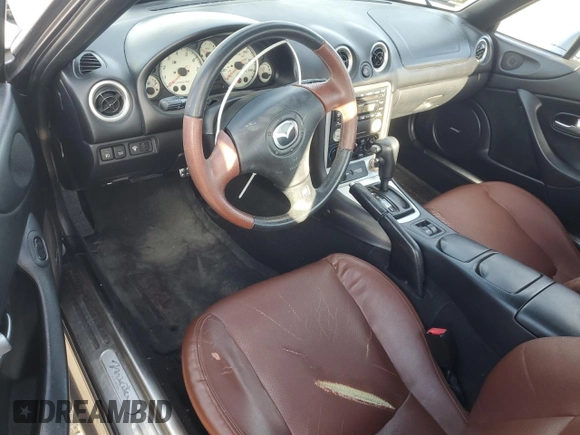 2002 Mazda MX-5 Miata Cloth with VIN JM1NB353X20228420, listed as a Copart auction lot 47949235 with 94,341 mi miles and Salvage title. Bid and sale history available at DreamBid. Image 8.