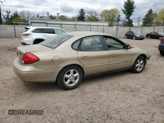 2001 Ford Taurus SE with VIN 1FAFP53U81G113131, listed as a Copart auction lot 51780905 with 85,094 mi miles and Salvage title. Bid and sale history available at DreamBid. Image 3.