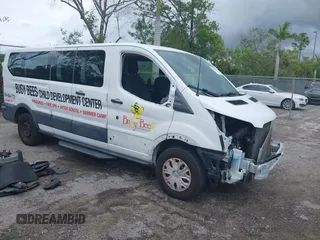 2018 Ford Transit Passenger XL with VIN 1FBZX2ZM0JKA10221, listed as a IAAI auction lot 41988879 with 54,340 mi miles and . Bid and sale history available at DreamBid. Image 1.