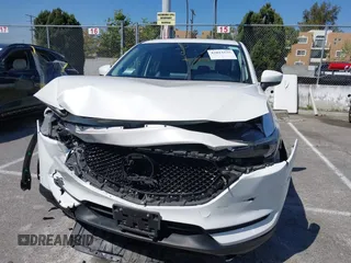 2018 Mazda CX-5 Grand Touring with VIN JM3KFADM8J0373368, listed as a IAAI auction lot 42013535 with 63,142 mi miles and . Bid and sale history available at DreamBid. Image 12.