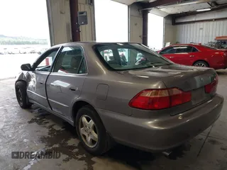 2000 Honda Accord EX z VIN 1HGCG1657YA053433, wystawiony jako IAAI lot #42322643 z przebiegiem 146 517 mil mil oraz . Historia ofert i sprzedaży dostępna na DreamBid. Obrazek 3.