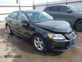 2015 Volkswagen Passat 1.8T Limited Edition with VIN 1VWAT7A31FC111352, listed as a IAAI auction lot 41575307 with 130,080 mi miles. Bid and sale history available at carsss.com. Image 1.