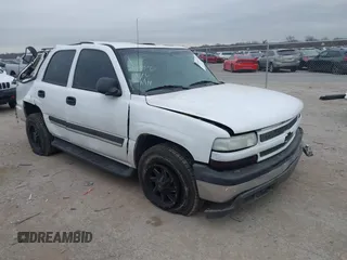 2004 Chevrolet Tahoe LT with VIN 1GNEC13Z74R313844, listed as a IAAI auction lot 41444672 with 233,620 mi miles. Bid and sale history available at carsss.com. Image 1.