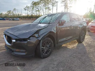 2019 Mazda CX-5 Touring with VIN JM3KFACM8K0694362, listed as a IAAI auction lot 41410185 with 89,443 mi miles. Bid and sale history available at carsss.com. Image 2.