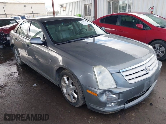 2005 Cadillac STS z VIN 1G6DW677X50185643, wystawiony jako IAAI lot #41730111 z przebiegiem 218 764 mil mil oraz . Historia ofert i sprzedaży dostępna na DreamBid. Obrazek 1.