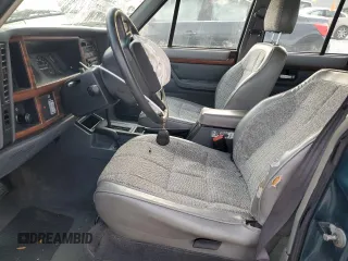 1996 Jeep Cherokee Country with VIN 1J4FJ78S7TL242853, listed as a Copart auction lot 73022554 with 84,868 mi miles and Salvage Title. Bid and sale history available at carsss.com. Image 7.
