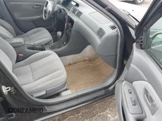 2001 Toyota Camry CE z VIN 4T1BG22K81U054795, wystawiony jako IAAI lot #42359932 z przebiegiem 167 341 mil mil oraz . Historia ofert i sprzedaży dostępna na DreamBid. Obrazek 5.