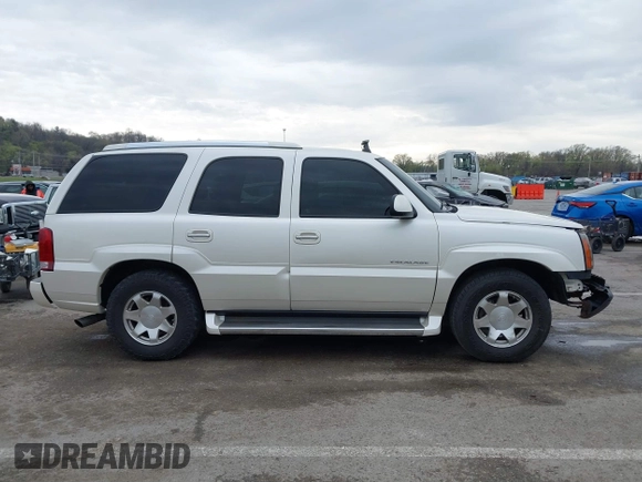 2005 Cadillac Escalade z VIN 1GYEK63N25R190908, wystawiony jako IAAI lot #41882135 z przebiegiem 243 333 mil mil oraz . Historia ofert i sprzedaży dostępna na DreamBid. Obrazek 13.