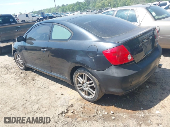 2005 Scion tC with VIN JTKDE177750026736, listed as a IAAI auction lot 42075370 with 246,192 mi miles. Bid and sale history available at carsss.com. Image 3.