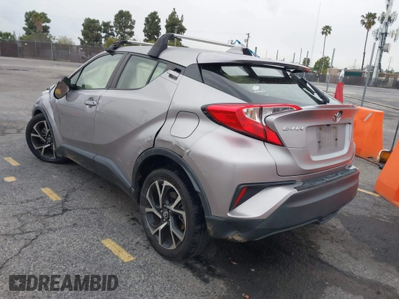 2019 Toyota C-HR XLE with VIN JTNKHMBX8K1046347, listed as a IAAI auction lot 41778368 with 49,918 mi miles and . Bid and sale history available at DreamBid. Image 3.