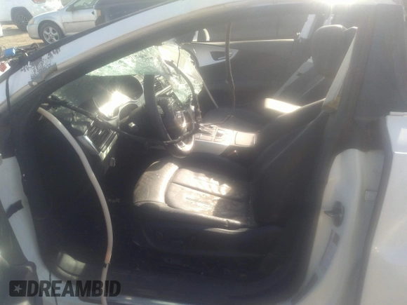 2012 Audi A7 Premium Plus with VIN WAUYGAFC1CN076403, listed as a IAAI auction lot 40976546 with 95,145 mi miles and . Bid and sale history available at DreamBid. Image 5.