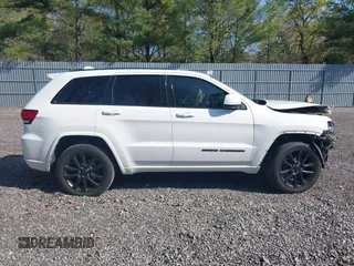 2018 Jeep Grand Cherokee Altitude with VIN 1C4RJFAG4JC309523, listed as a IAAI auction lot 42159534 with 86,682 mi miles and . Bid and sale history available at DreamBid. Image 13.