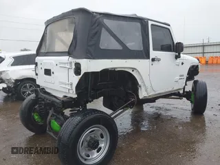 2013 Jeep Wrangler Sport with VIN 1C4AJWAG8DL601399, listed as a IAAI auction lot 42186399 with 130,195 mi miles and . Bid and sale history available at DreamBid. Image 4.