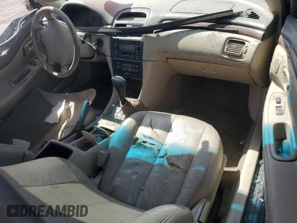 2000 Toyota Solara SE z VIN 2T1CF28P0YC350027, wystawiony jako Copart lot #52181555 z przebiegiem 220 178 mil mil oraz Szkoda całkowita • Salvage title. Historia ofert i sprzedaży dostępna na DreamBid. Obrazek 8.