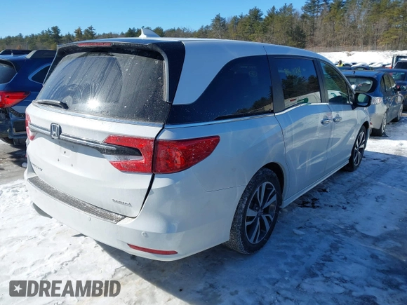 2023 Honda Odyssey Touring with VIN 5FNRL6H81PB008129, listed as a IAAI auction lot 41610714 with 57,273 mi miles and . Bid and sale history available at DreamBid. Image 4.