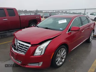 2013 Cadillac XTS Luxury with VIN 2G61P5S32D9115640, listed as a IAAI auction lot 41065284 with 125,643 mi miles and . Bid and sale history available at carsss.com. Image 19.