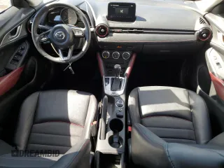 2018 Mazda CX-3 Touring z VIN JM1DKFC74J0312864, wystawiony jako Copart lot #55862845 z przebiegiem 75 584 mil mil oraz Szkoda całkowita • Salvage title. Historia ofert i sprzedaży dostępna na DreamBid. Obrazek 8.