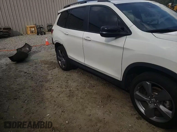 2021 Honda Passport Touring z VIN 5FNYF7H91MB015479, wystawiony jako Copart lot #56127214 z przebiegiem 28 039 mil mil oraz Szkoda całkowita • Salvage title. Historia ofert i sprzedaży dostępna na DreamBid. Obrazek 10.