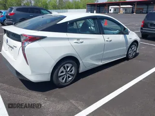 2017 Toyota Prius Two with VIN JTDKARFU7H3054054, listed as a IAAI auction lot 42028565 with 64,805 mi miles. Bid and sale history available at carsss.com. Image 4.