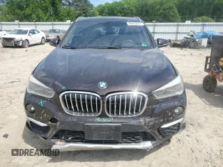 2017 BMW X1 xDrive28i z VIN WBXHT3C39H5F72979, wystawiony jako Copart lot #56003625 z przebiegiem 101 184 mil mil oraz Szkoda całkowita • Salvage title. Historia ofert i sprzedaży dostępna na DreamBid. Obrazek 5.