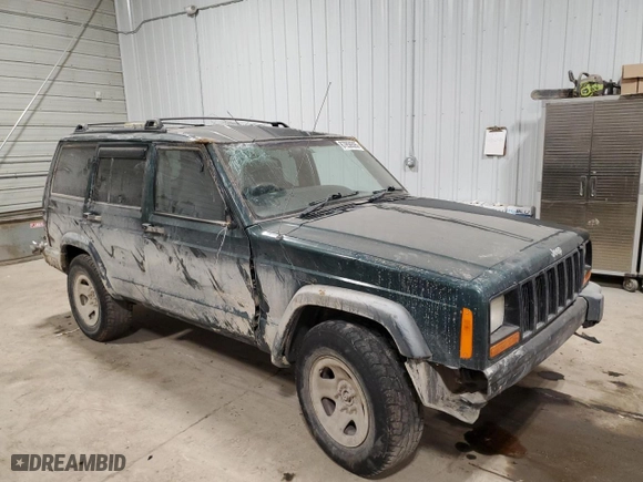 2000 Jeep Cherokee RH Drive with VIN 1J4FN28S5YL119325, listed as a Copart auction lot 87856595 with NaN miles and Salvage Title. Bid and sale history available at carsss.com. Image 4.