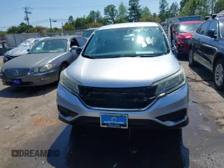 2015 Honda CR-V LX z VIN 2HKRM3H39FH500617, wystawiony jako IAAI lot #42028379 z przebiegiem 97 117 mil mil oraz . Historia ofert i sprzedaży dostępna na DreamBid. Obrazek 12.