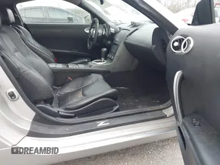 2003 Nissan 350Z Touring z VIN JN1AZ34E13T007885, wystawiony jako IAAI lot #41567717 z przebiegiem 149 279 mil mil oraz . Historia ofert i sprzedaży dostępna na DreamBid. Obrazek 5.