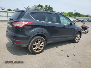 2013 Ford Escape SEL z VIN 1FMCU9H94DUD47723, wystawiony jako Copart lot #59765595 z przebiegiem 129 551 mil mil oraz Szkoda całkowita • Salvage title. Historia ofert i sprzedaży dostępna na DreamBid. Obrazek 3.