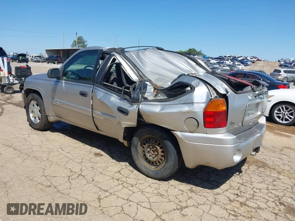 2004 GMC Envoy SLE with VIN 1GKDS13S242420100, listed as a IAAI auction lot 41963800 with 341,395 mi miles and . Bid and sale history available at DreamBid. Image 3.