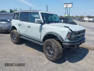 2022 Ford Bronco z VIN 1FMEE5DP3NLA80097, wystawiony jako IAAI lot #42461114 z przebiegiem 32 406 mil mil oraz . Historia ofert i sprzedaży dostępna na DreamBid. Obrazek 1.
