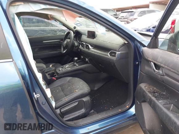2018 Mazda CX-5 Touring z VIN JM3KFACM5J1442416, wystawiony jako IAAI lot #42093137 z przebiegiem 65 102 mil mil oraz . Historia ofert i sprzedaży dostępna na DreamBid. Obrazek 5.