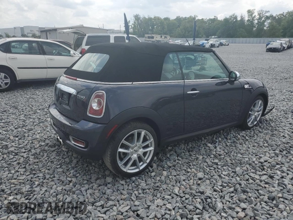 2012 MINI Convertible S with VIN WMWZP3C56CT250886, listed as a Copart auction lot 50027405 with 92,990 mi miles and Salvage title. Bid and sale history available at DreamBid. Image 3.