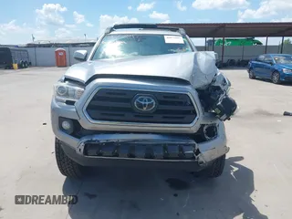 2018 Toyota Tacoma SR with VIN 3TMCZ5AN2JM172829, listed as a IAAI auction lot 42073847 with 136,671 mi miles and . Bid and sale history available at carsss.com. Image 13.