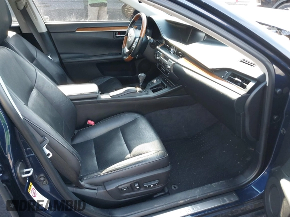 2014 Lexus ES 300h with VIN JTHBW1GG7E2071500, listed as a IAAI auction lot 41676321 with 64,217 mi miles and . Bid and sale history available at DreamBid. Image 5.