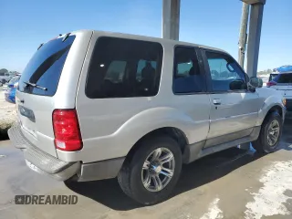 2003 Ford Explorer Sport XLS z VIN 1FMYU60E43UB05641, wystawiony jako Copart lot #87804375 z przebiegiem 130 434 mil mil oraz Szkody całkowita. Historia ofert i sprzedaży dostępna na DreamBid. Obrazek 3.