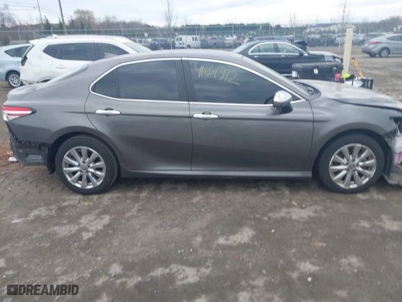 2020 Toyota Camry LE with VIN 4T1C11AK0LU400052, listed as a IAAI auction lot 41861392 with 71,213 mi miles. Bid and sale history available at carsss.com. Image 13.