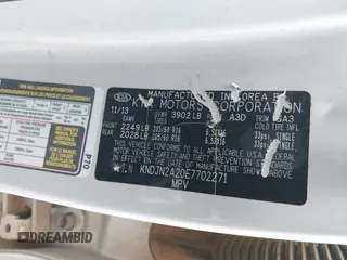 2014 Kia Soul with VIN KNDJN2A20E7702271, listed as a IAAI auction lot 41555814 with 125,296 mi miles. Bid and sale history available at carsss.com. Image 9.