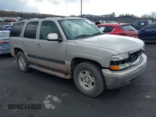 2005 Chevrolet Tahoe LS with VIN 1GNEK13T05J197479, listed as a IAAI auction lot 41693575 with 124,537 mi miles. Bid and sale history available at carsss.com. Image 1.