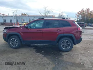 2019 Jeep Cherokee Trailhawk Elite with VIN 1C4PJMBX6KD378848, listed as a IAAI auction lot 40754408 with 52,901 mi miles. Bid and sale history available at carsss.com. Image 13.