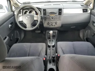 2009 Nissan Versa 1.8 S with VIN 3N1BC13E69L475670, listed as a Copart auction lot 51492935 with 118,754 mi miles and Salvage Title. Bid and sale history available at carsss.com. Image 8.