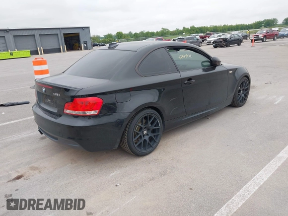 2012 BMW 1 Series 135i with VIN WBAUC9C5XCVM12693, listed as a IAAI auction lot 42341971 with 121,596 mi miles and . Bid and sale history available at DreamBid. Image 4.