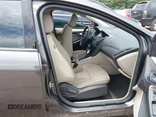 2016 Ford Focus SE z VIN 1FADP3F2XGL397092, wystawiony jako IAAI lot #42619802 z przebiegiem 232 252 mil mil oraz . Historia ofert i sprzedaży dostępna na DreamBid. Obrazek 5.