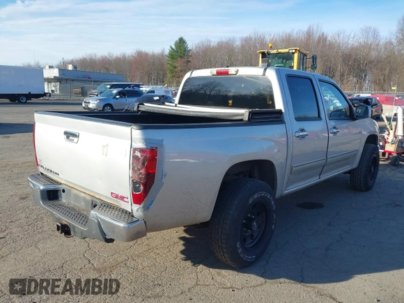 2012 GMC Canyon SLE1 with VIN 1GTH6MFE2C8106354, listed as a IAAI auction lot 41910921 with 127,812 mi miles. Bid and sale history available at carsss.com. Image 4.
