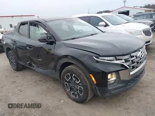 2022 Hyundai Santa Cruz SEL z VIN 5NTJBDAE5NH008011, wystawiony jako IAAI lot #41614699 z przebiegiem 57 484 mil mil oraz . Historia ofert i sprzedaży dostępna na DreamBid. Obrazek 1.